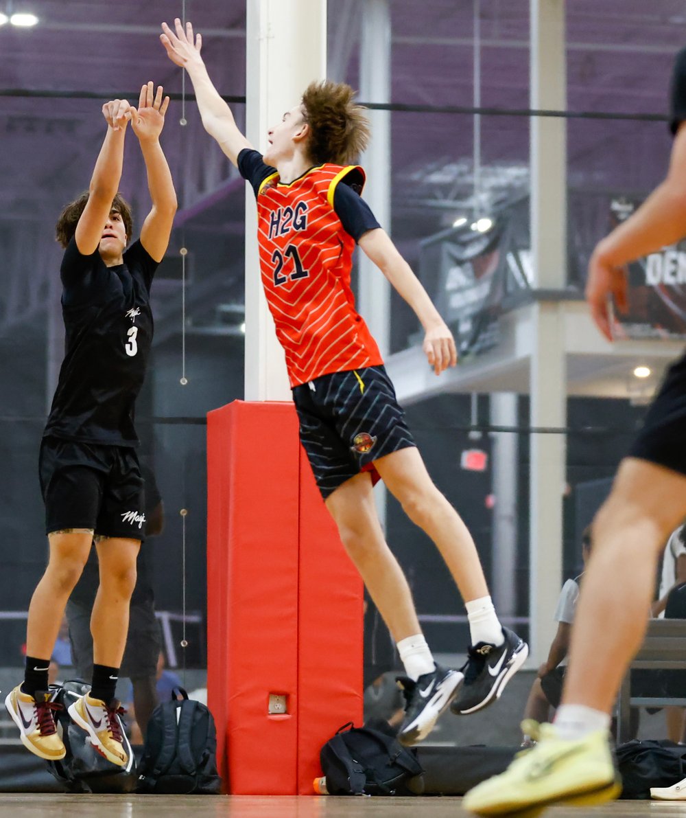 Youth basketball players competing at a Texas Basketball Alliance tournament